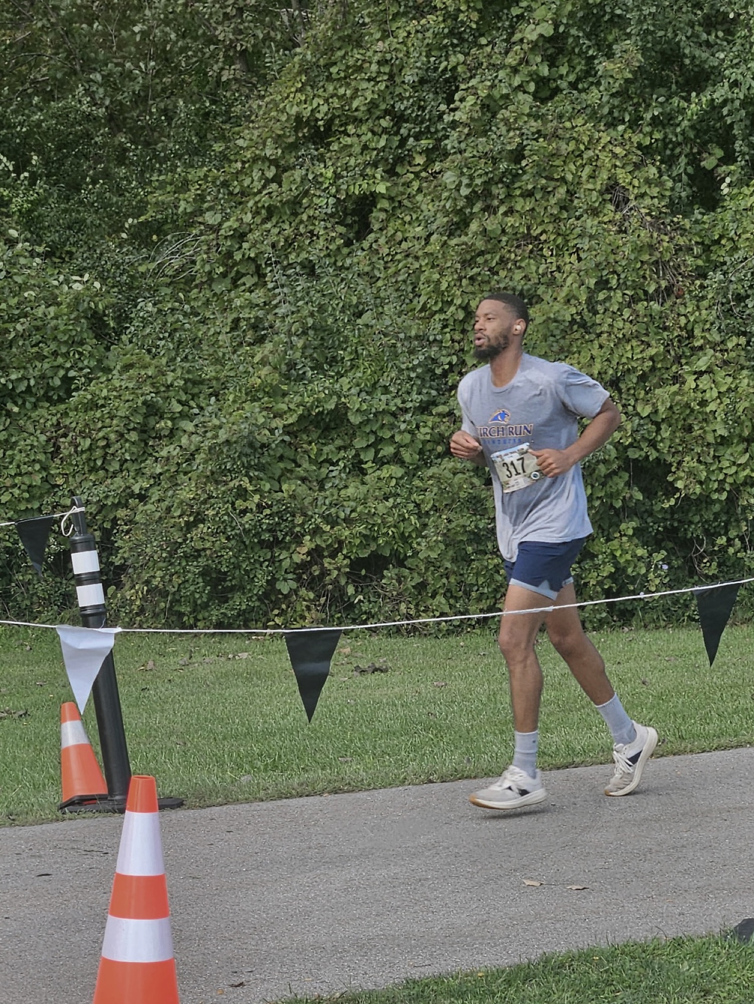 Chaz Johnson running the Mott Lake Trail Run, bib 317
